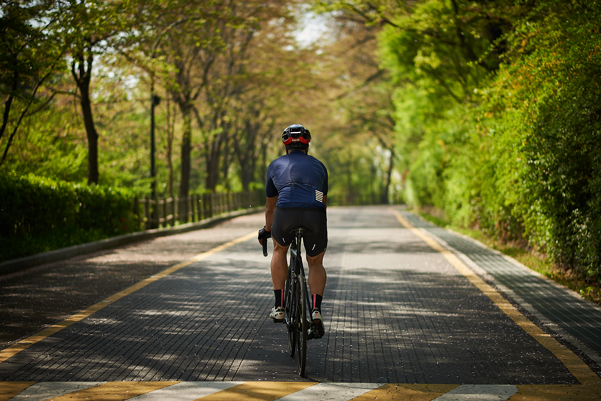 Cyclist portrait while riding a road bicycle by Cristian Bucur, photographer in Bonifacio Global City  