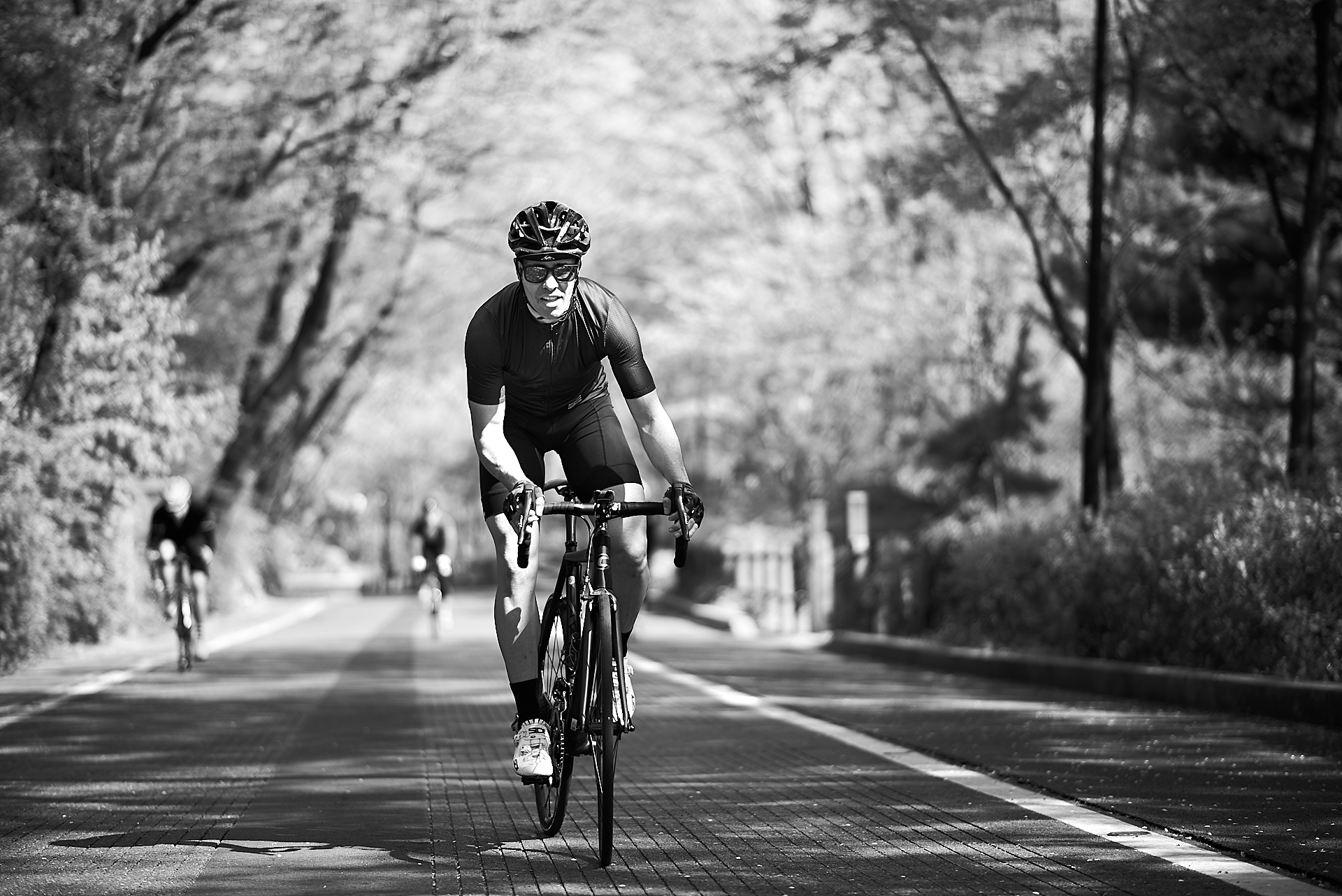 Cyclist portrait while riding a road bicycle by Cristian Bucur, photographer in Bonifacio Global City  